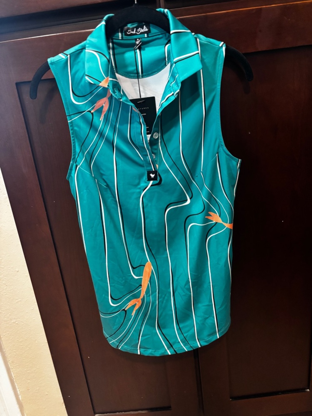 Bad Birdie Women's Turquoise Sleeveless Golf Polo and Skorts